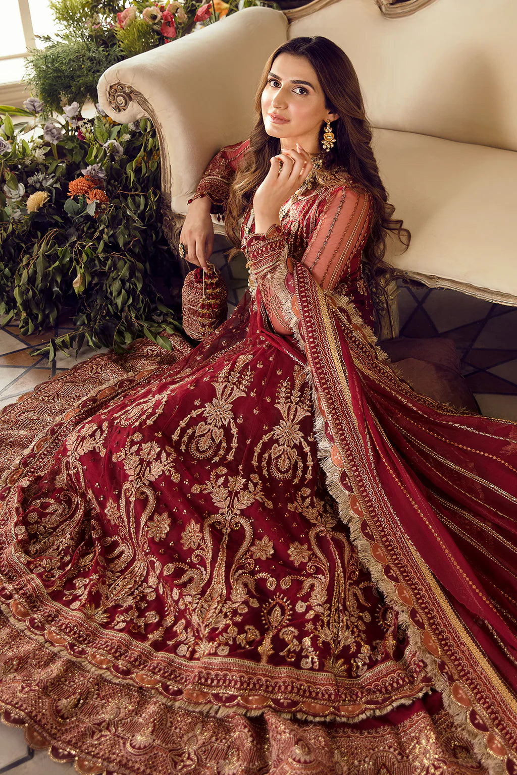Currant Red embroidered Pishwas with gold zardosi detailing, chiffon dupatta, and raw silk trouser – perfect for festive and wedding wear.