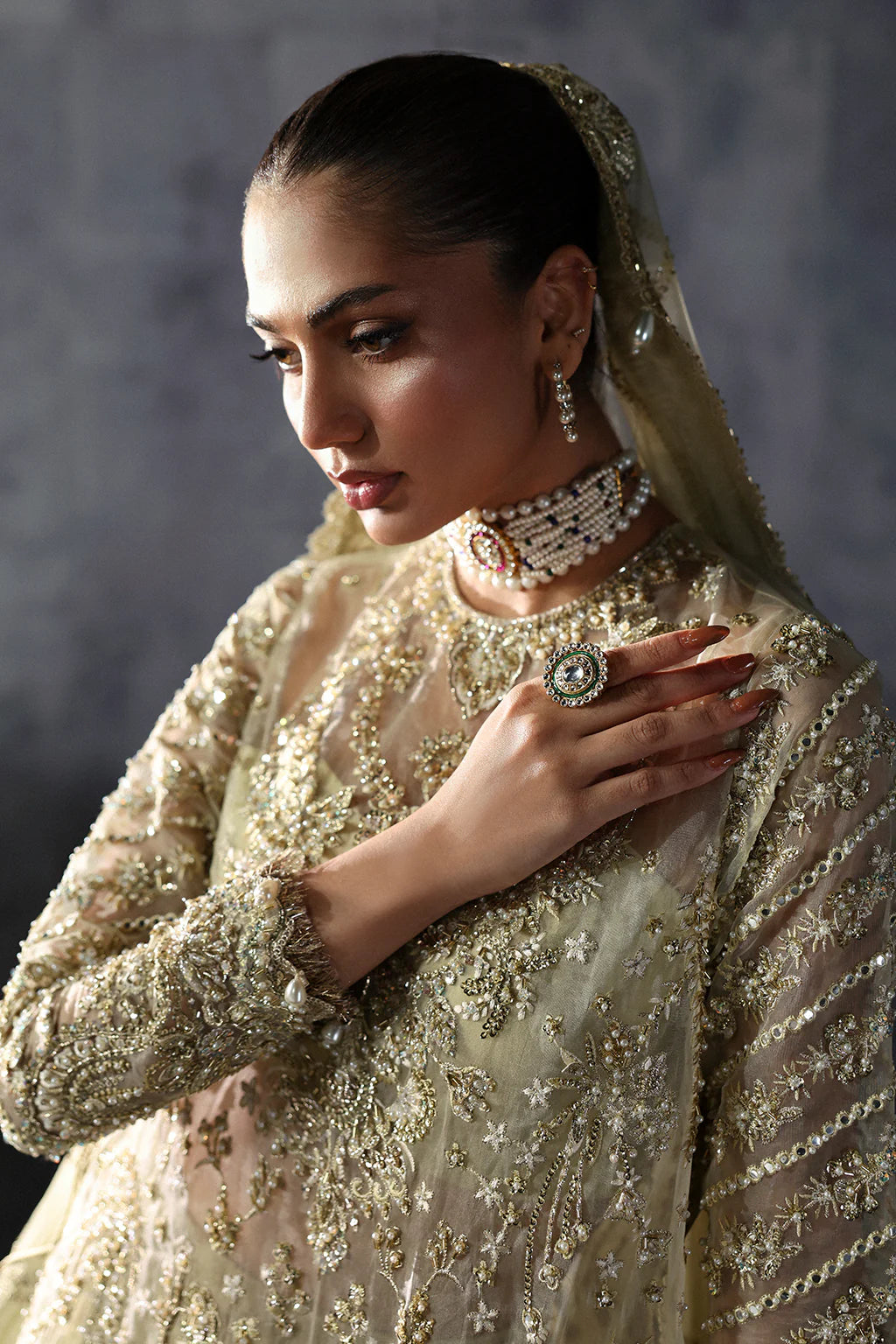 Orazio – Embroidered organza shirt with tilla, sequins, pearls, embellished lehenga, and panni-work organza dupatta.