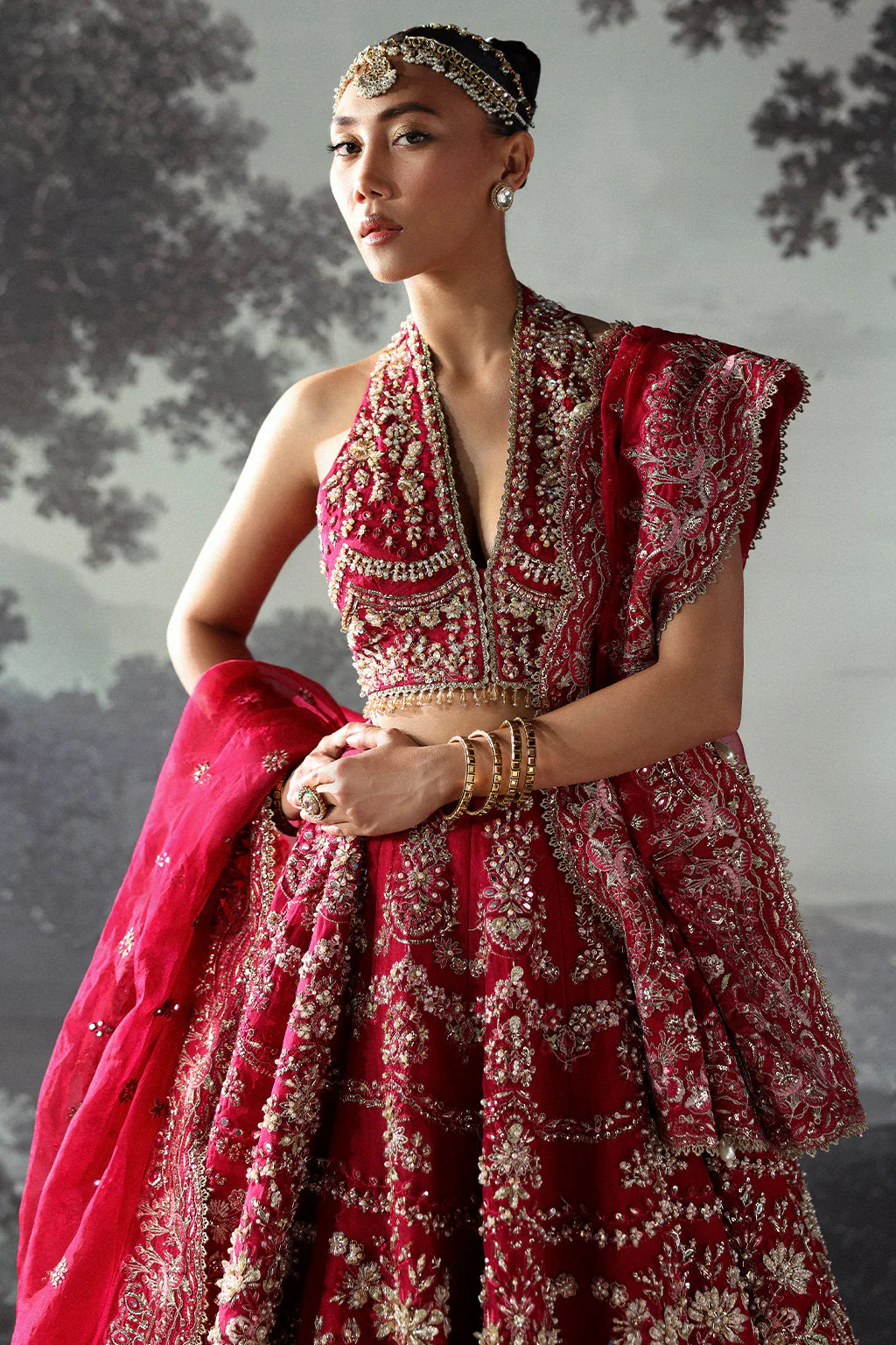 Claude – Deep pink organza lehenga choli with pearls, moti, tilla, sequins, cut dana embroidery & floral-bordered dupatta.