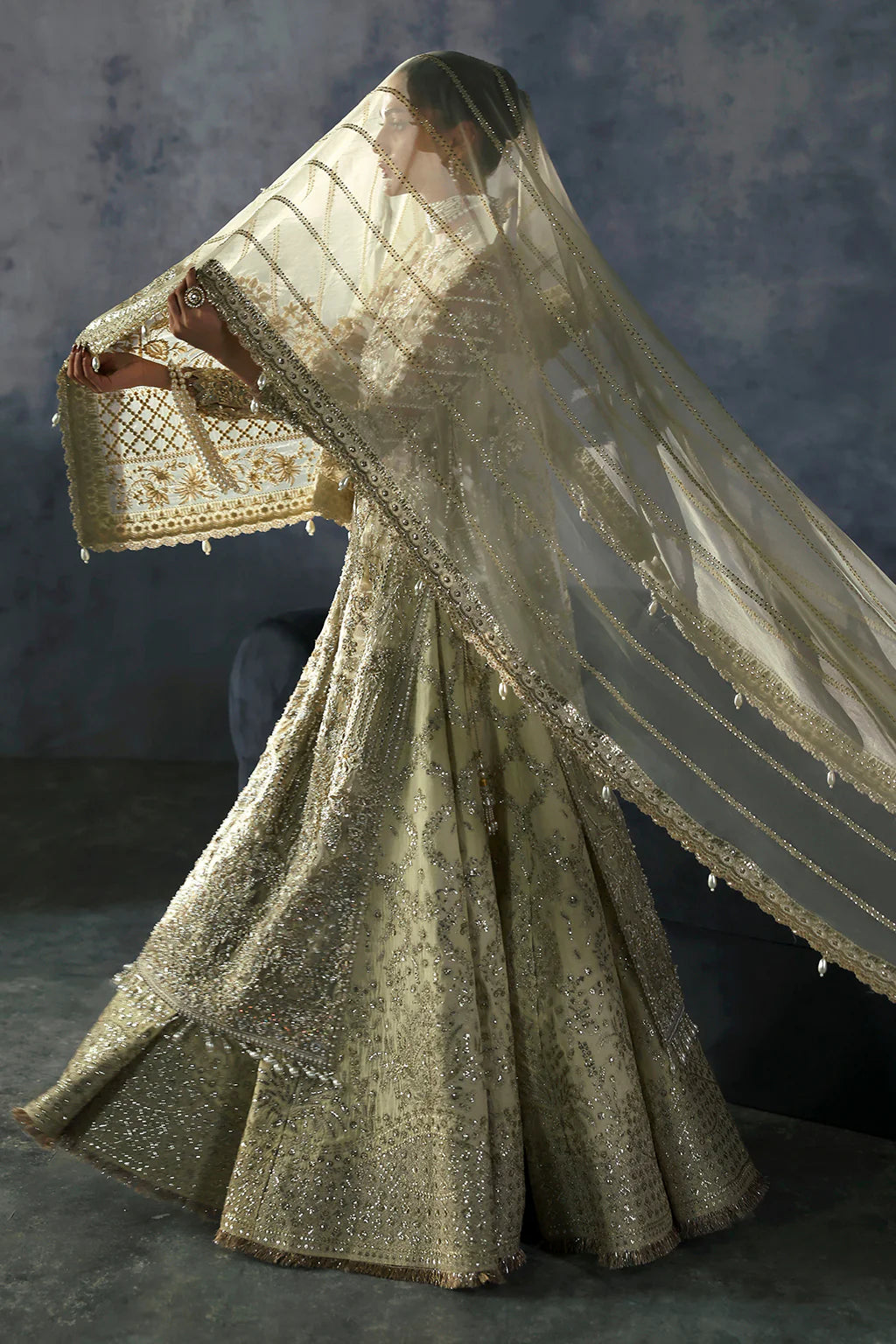 Orazio – Embroidered organza shirt with tilla, sequins, pearls, embellished lehenga, and panni-work organza dupatta.