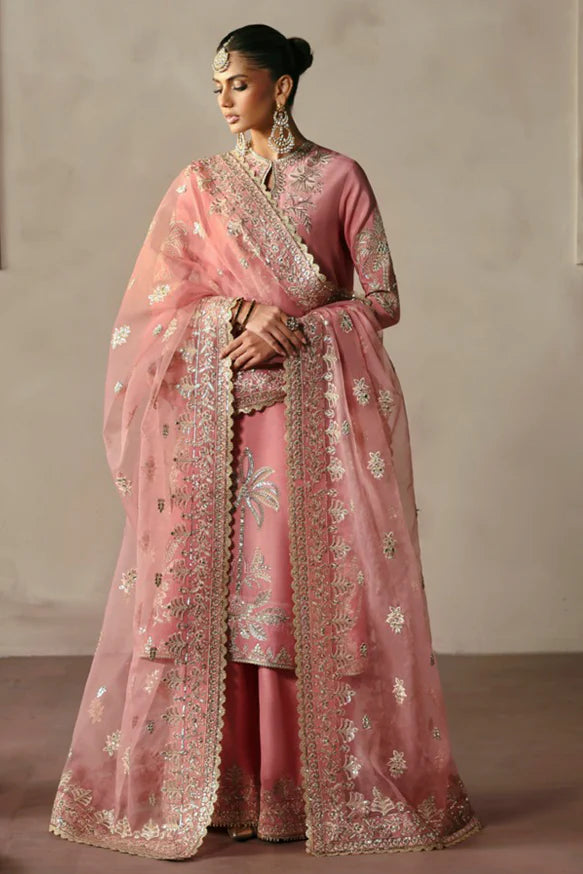 Gulrukh – Powder pink raw silk outfit with floral embroidery, golden panni, copper tilla, and embroidered dupatta.