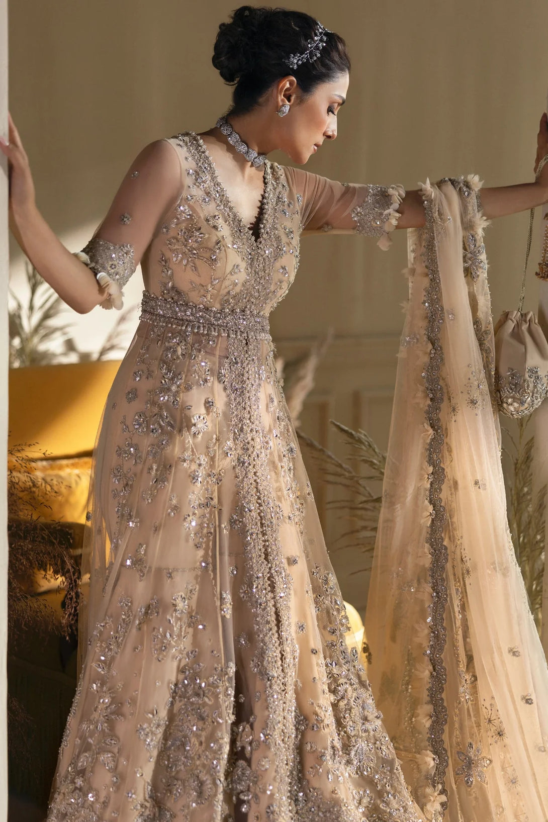 "Buy Pearl of Tranquility online – a luxury embroidered wedding dress by Élan, adorned with Swarovski crystals, seed pearls, and an ethereal net dupatta."

